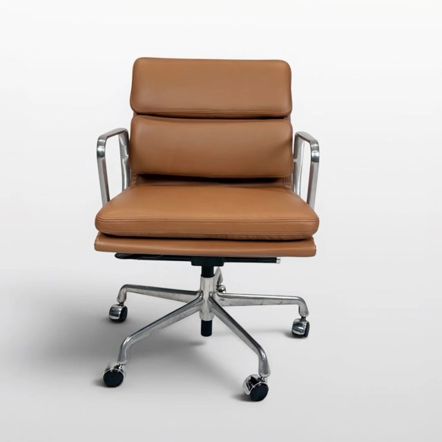 An authentic Eames Aluminum Group Soft Pad Management Chair by Herman Miller, originally designed by Charles & Ray Eames....