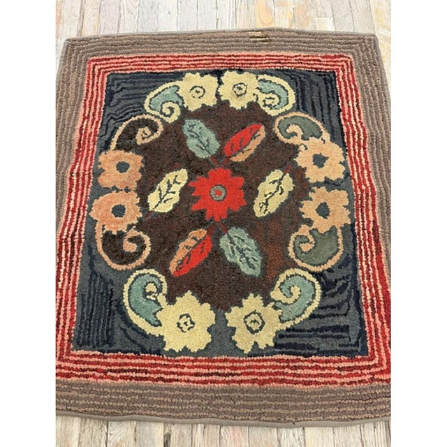 This is a charming and highly authentic small antique American Hooked accent rug, dating back to circa 1880. Measuring a...