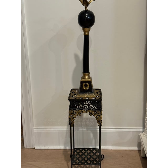 The Gran Tour Style Metal Tall French Empire Neo-Classical Obelisk Statuette is a stunning decorative piece inspired by...