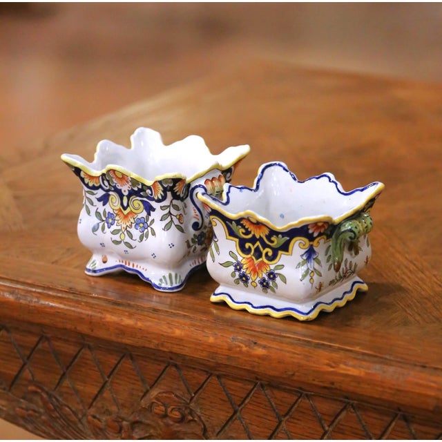 Add a touch of French provincial charm to a mantel, bookshelf, or tabletop with this delightful near pair of antique Rouen...