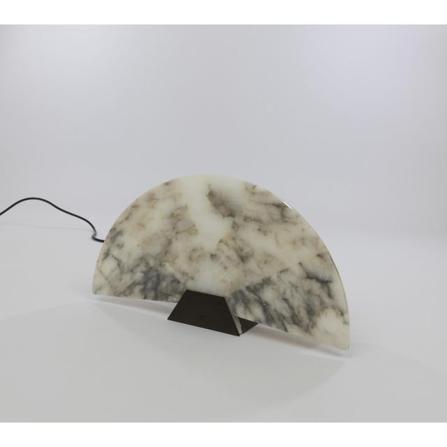 Ventaglio table lamp designed by Angelo Mangiarotti in 1987 and manufactured by Skipper Pollux. The model consists of...