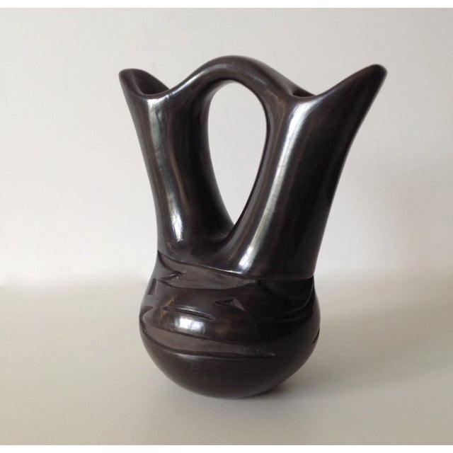 Original; signed, Linda Naranjo one of the most well-known ceramicist, who produced pieces for the Santa Clara of...