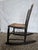 Authentic late 19th-century antique child’s rocking chair featuring classic rocker feet and a hand-caned seat. Solid wood...