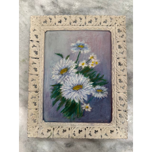 Floral still life oil painting of daisies circa the mid-20th century. Painting of purples, blues, greens, whites and...