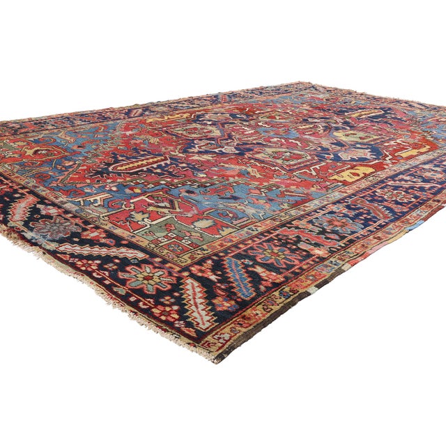 90025 Antique Persian Serapi Rug, 08'09 x 12'02. This exquisite hand-knotted wool antique Persian Serapi rug, dating back...