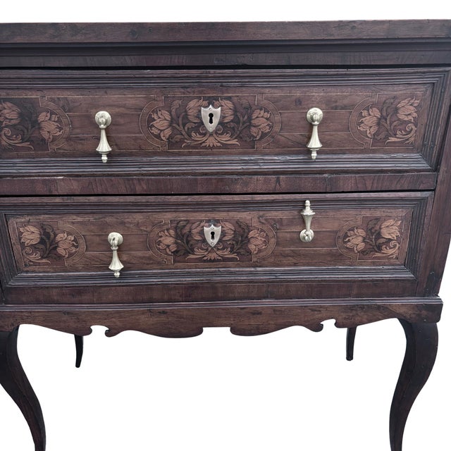 A fine Eighteenth Century Italian walnut two drawer chest circa 1780. The chest is fitted with fitted with two drawers...