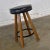 Beautiful swivel bar stool attributed to A. Brandt comprised of solid ranch oak and a dark brown almost black vinyl or...