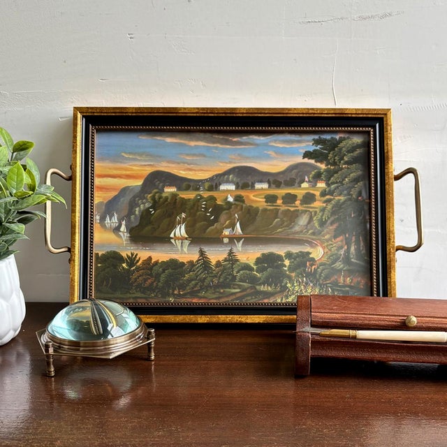 This small decorative tray is beautifully finished with a folk art print of the Hudson River at West Point, originally...