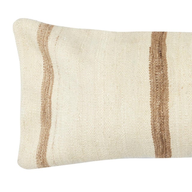 Add a touch of history and warmth to your space with this vintage handmade Turkish hemp kilim cushion cover. Crafted from...