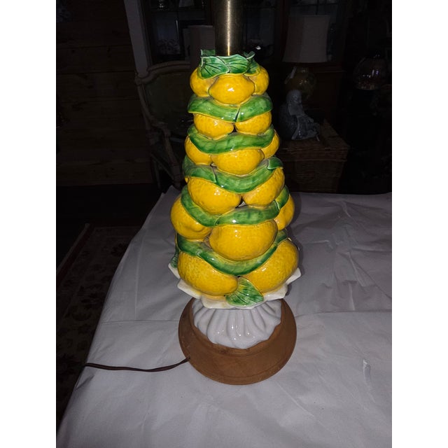 Vintage Italian Ceramic Lemon Topiary Lamp with a wooden base.