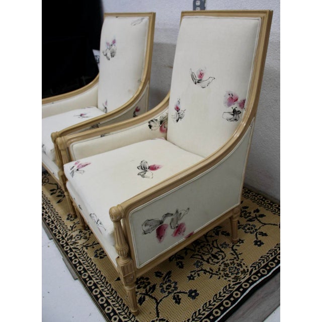 Bring a touch of classic elegance into your home with this beautiful pair of high-back armchairs. Each chair features a...