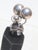 Sterling silver modernist construction of sculptural elements designed around rising spheres of silver wound around a...