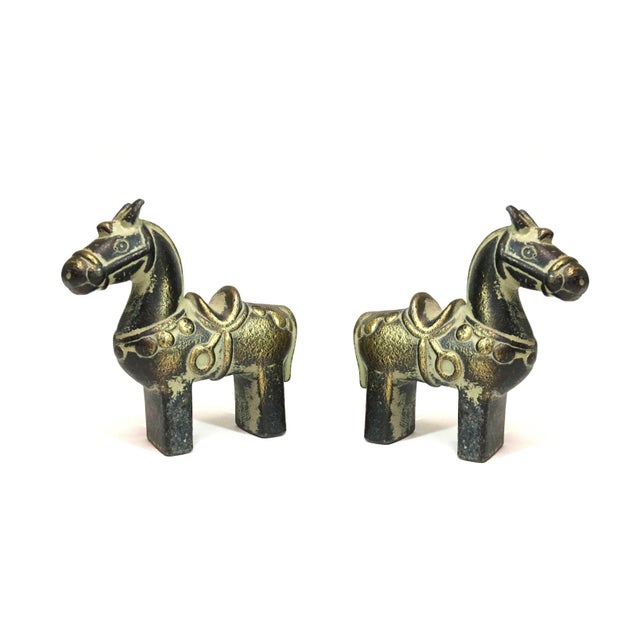 This exquisite pair of brass pony figurines will add a touch of elegance and whimsy to any room, perfect for collectors...