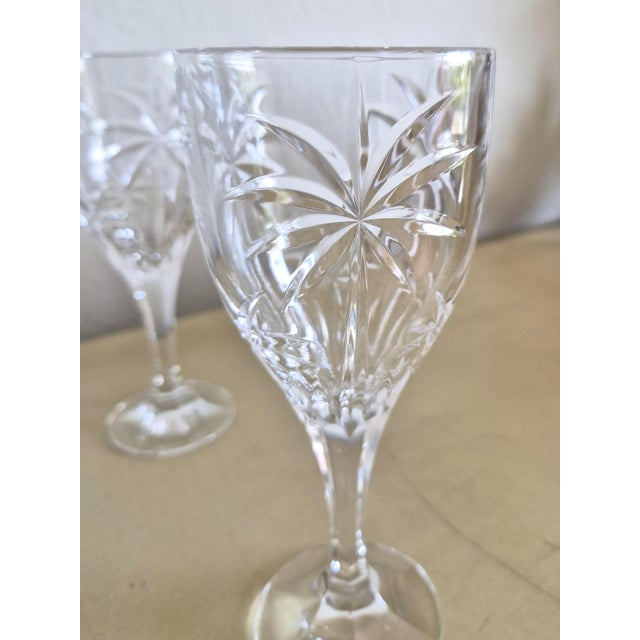 Vintage 1980's Godinger crystal stemware, South Beach Collection with a cut palm tree pattern. Set of 8 in perfect...