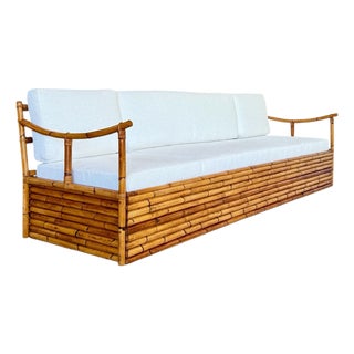 Mid-20th Century Monumental Restored Stacked Rattan Sofa With Custom Upholstery & Hidden Storage For Sale