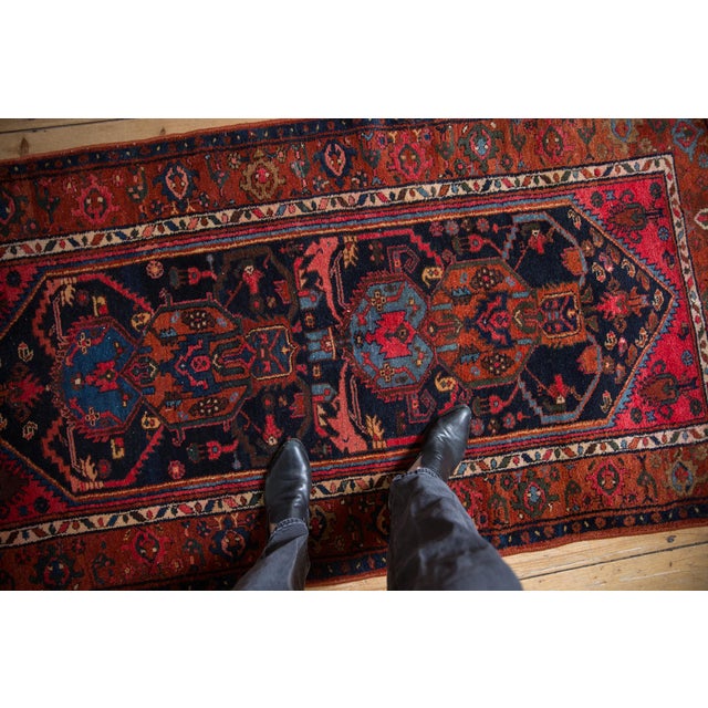 :: Covered field of sprawled tendrils encompassing central floral panels with interior geometric serrated leaves and...