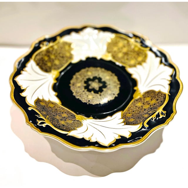 This vintage Weimar German porcelain plate is a stunning addition to any collection. the design was unique . The intricate...