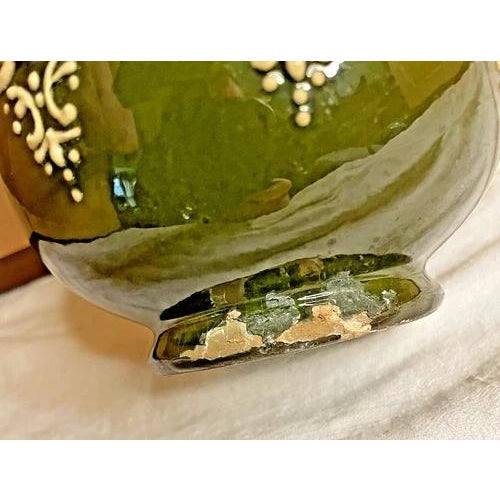 This highly collectible Weller Pottery "Turada" onion-form art vase dates to circa 1897, capturing the peak of the...