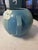 The Roseville Pottery Primrose Art Deco Jardinier Vase in blue, made in 1932, is a vintage piece of North American art...
