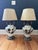 Elegant pair ( 2 total) of vintage table lamps in the style of Carl Falkenstein featuring sculptural ceramic bases with...