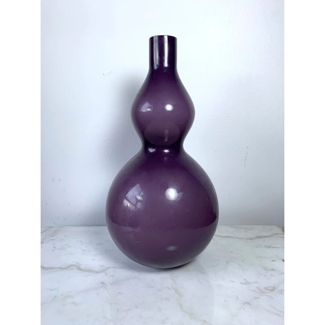 The Tall Vintage Aubergine Cased Glass Double Gourd Hooped Vase is a stunning piece of decorative art that is in excellent...