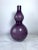 The Tall Vintage Aubergine Cased Glass Double Gourd Hooped Vase is a stunning piece of decorative art that is in excellent...