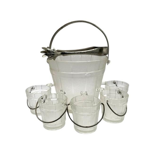 A charming mid 20th century pressed glass ice bucket formed to look like an old oak pail with 5 cups and a set of ice...