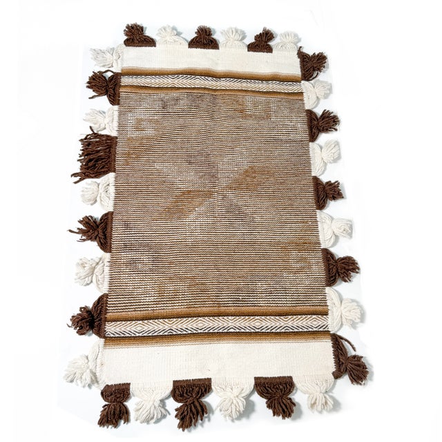 A fabulous piece of vintage fiber art with all the earthy charm of the 1970s! This beautifully textured woven textile...