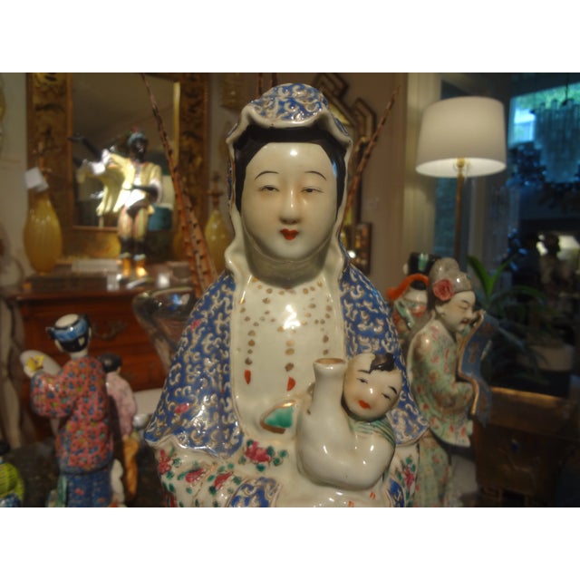 Beautifully hand decorated antique Chinese porcelain figure. This stunning colorful finely detailed figurine or sculpture...