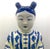 Hand painted Imperial Court Girl Holding Plate. Blue and White yet jacket is in a light yellow. Stands near 13" tall....