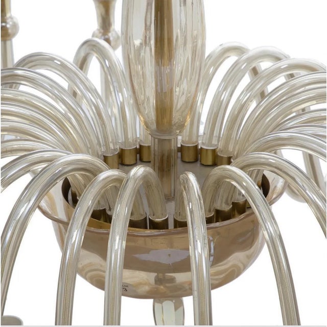 - Large Murano amber-glass chandelier with 24 arms - Fitted with E14 sockets - Made in the 1950s in Italy European Plug...