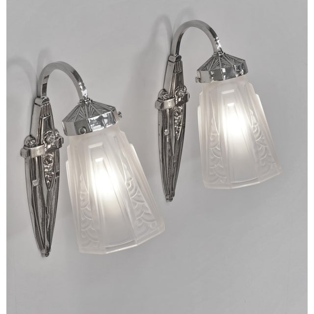 Charles Schneider A beautiful pair of 1925-1930 French art deco wall sconces in nickel on cast solid brass or bronze...