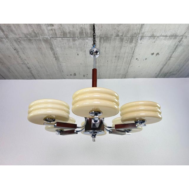 Large art deco chandelier with opaline glass lampshades attr. to Adolf Loos. Professionally stained and repolished. Up to...