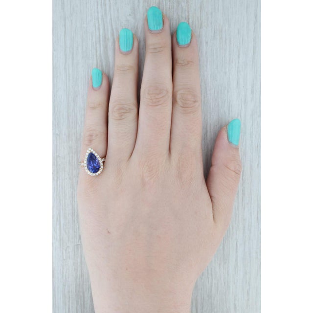 Gemstone Information: - Natural Tanzanite - Carats - 4.64ct Cut - Pear Color - Purple Blue Treatment - Heated - Natural...