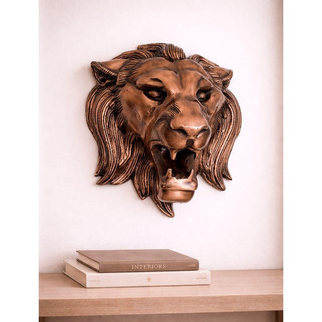 Upgrade your home décor with this stunning antique-style lion head wall mount, crafted from real metal and finished in a...