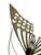 A sculptural vintage brass butterfly featuring intricately pierced wings and delicate wire antennae. The openwork design...