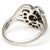 White gold swirls in a heart shape around sparkling diamonds to create a romantic ring that's perfect to celebrate a...