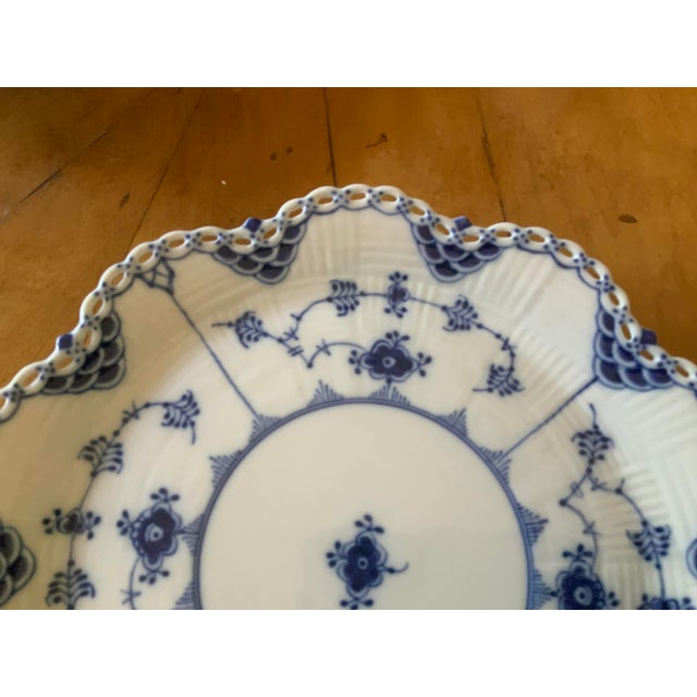 Full lace gives the edge a beautiful delicate petal like appearance paired with fish scale decorations lining the textured...