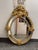 Design Plus Gallery presents a French Giltwood Cushion Wall Mirror from the 20th Century. The mirror showcases exuberant...