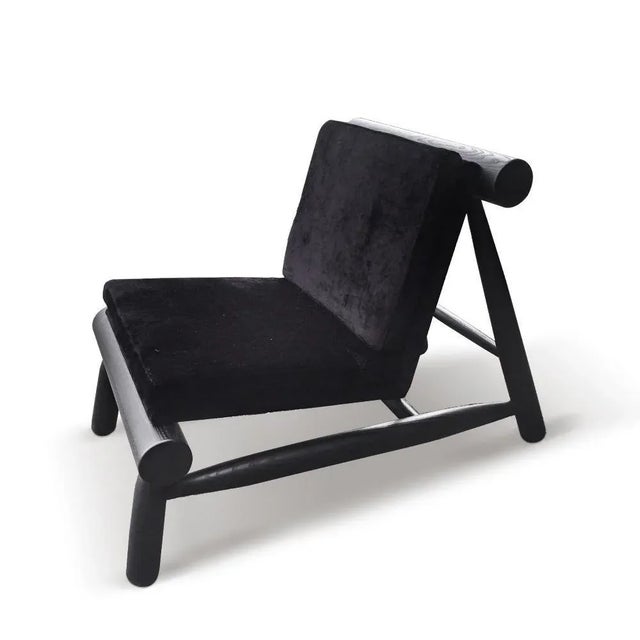Seso armchair by collector designer: davide monopoli materials: upholstered in siege black fabric. Solid oak wood...