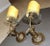 Pair of beautiful Italian bronze or brass sea horse motif wall sconces with intricately etched glass bobeche. Each uses...