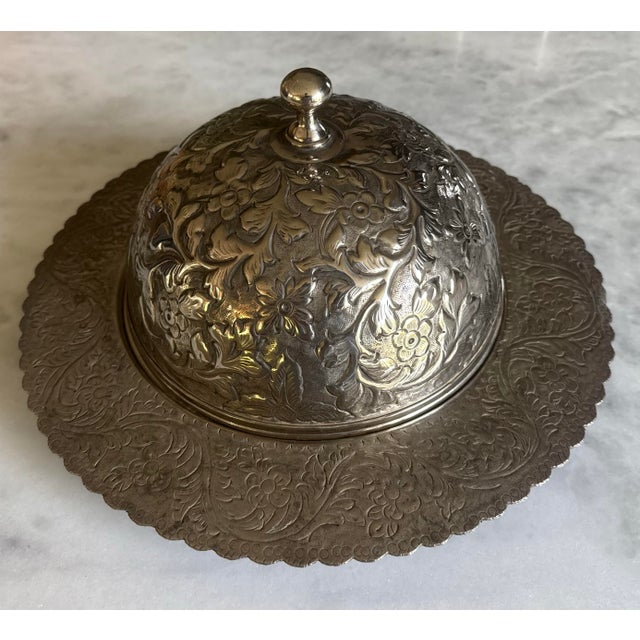 Vintage handmade silverplate serving dish with dome lid and intricate hammered floral design adding wonderful texture....
