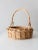 Ideal as a catchall, this vintage wicker basket features a twisted top handle. The sturdy woven basket's basin is great...