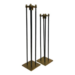 Mid Century Transitional Black Metal and Brass Candlesticks, a Pair For Sale