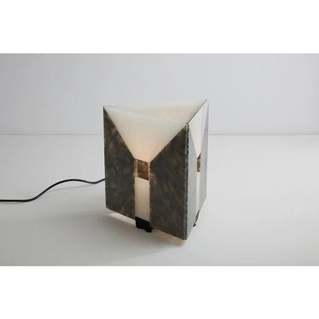 Metal structure with alabaster diffuser of different colors. Skipper production period 1987 This piece has an attribution...