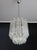 Fantastic vintage murano chandelier made by 47 murano trasparent crystal prism "quadriedri" in a nickel metal frame. The...