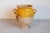 This 19th-century Spanish pottery jar is a beautiful example of rustic Mediterranean craftsmanship. Handcrafted from...