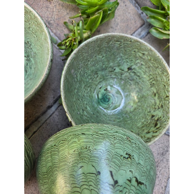 a set of green marbled clay/pottery bowls. The marbled effect is made from mixing two colored clays together. Set 4. Food...