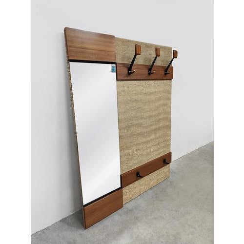 This fantastic mid-century wall coat rack is a feast for the eyes and highly decorative. Origin: Germany. Easy to place in...