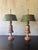 A striking pair of 1940s French painted toleware table lamps, retaining their wonderfully unusual original-style painted...